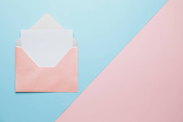 Blank card and envelope on color background - Foto, Imagem