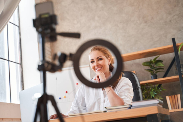 Contented HR director smiling to the camera at job interview - Foto, Bild