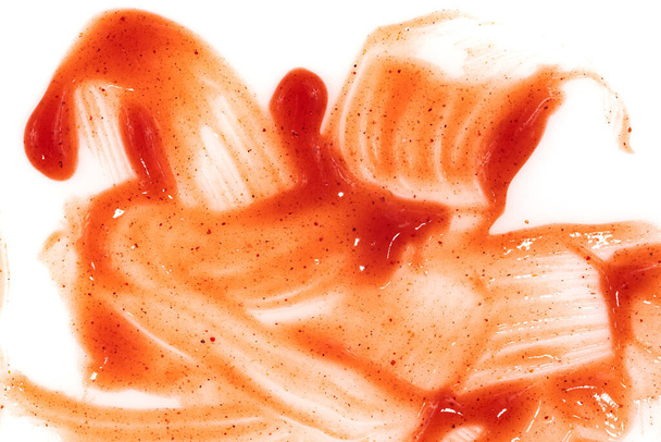 Tomato ketchup sauce  on a white background. Spots and stripes ketchup texture - Photo, Image