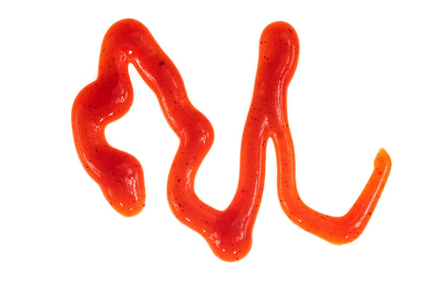 Beyaz arka planda izole edilmiş domates ketçap sosu. Noktalar ve çizgiler ketçap dokusu - Fotoğraf, Görsel