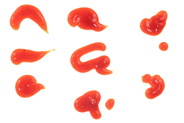 Beyaz arka planda izole edilmiş domates ketçap sosu. Noktalar ve çizgiler ketçap dokusu - Fotoğraf, Görsel
