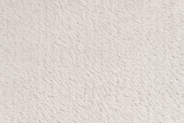 Lana natural blanca con fondo de textura blanca. cuadros de lana sin costura blanca. textura de piel esponjosa para diseñadores, primer plano fragmento alfombra de lana blanca - Foto, imagen