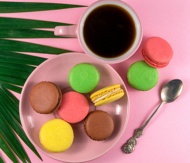 colored macaroons on a  pink  background - 写真・画像
