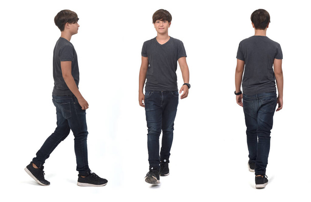dezelfde tiener jongen lopen op wit, voor, zij-en achteraanzicht - Foto, afbeelding