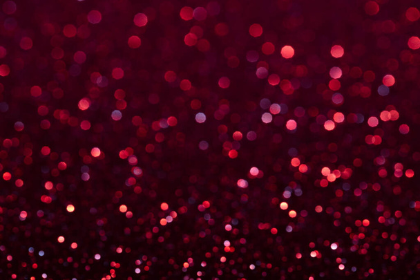 blured red glitter texture abstract background - Foto, afbeelding