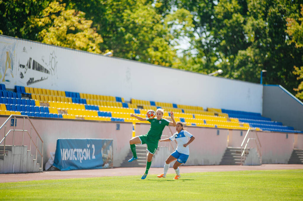 Kharkiv, Ukraine -September 13, 2020: Football match of Women Professional league of Ukraine Zhitlobud2 - Karpaty - 写真・画像