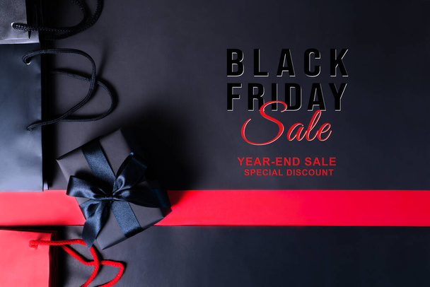Black Friday Sale, schwarze Geschenkbox und Einkaufstasche zum Online-Shopping - Foto, Bild