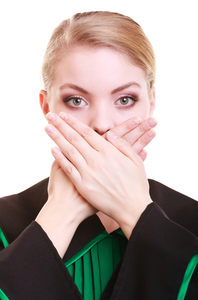 Woman lawyer attorney wearing classic polish gown covering mouth - Photo, image
