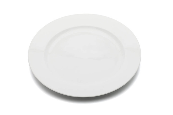 High angle view white empty plate on white background. Clipping path included - Foto, afbeelding
