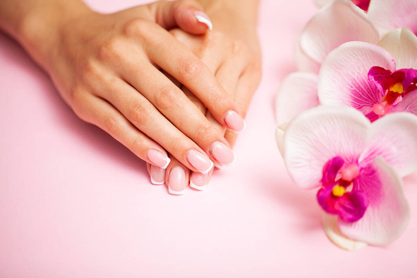 Young woman after getting professional manicure in beauty salon - Photo, Image
