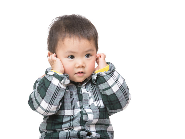 ázsiai baby boy touch a fülébe - Fotó, kép