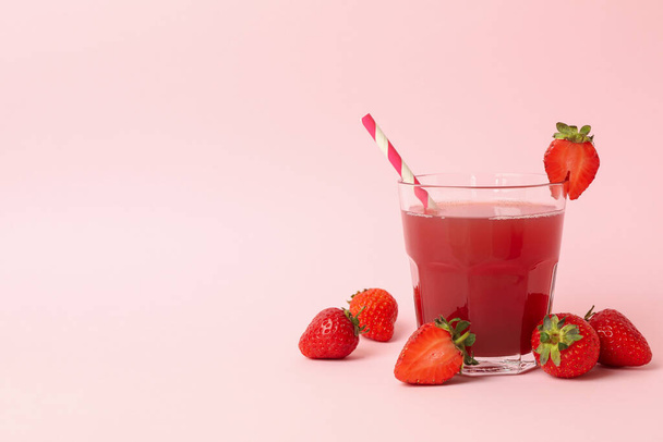 Glass with fresh strawberry juice on pink background - Photo, Image