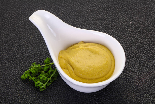 Mustard sauce in the bowl served parsley - Photo, Image