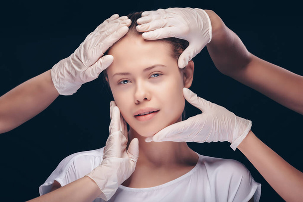 Portrait of young Caucasian woman getting cosmetic injection - Fotó, kép