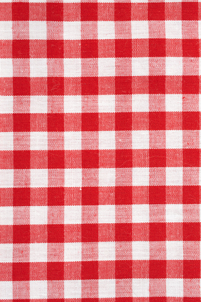 piros-fehér kockás terítő háttér - Fotó, kép