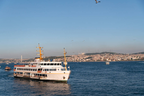 The passenger ferry ship is on the Bosphorus in Istanbul, Turkey - Fotó, kép