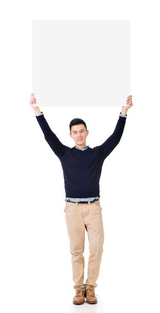 Asian man holding a blank board - Zdjęcie, obraz
