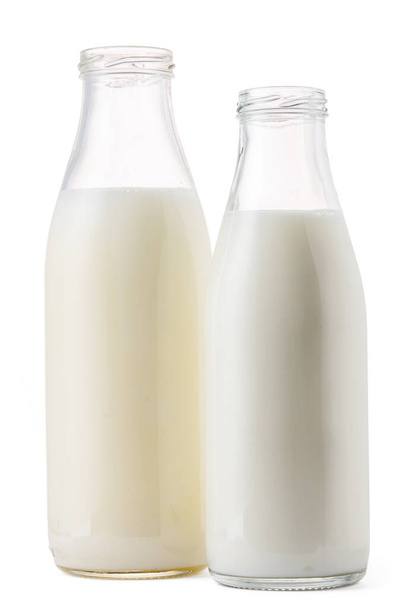 Open glass bottle of milk isolated on white - Фото, изображение