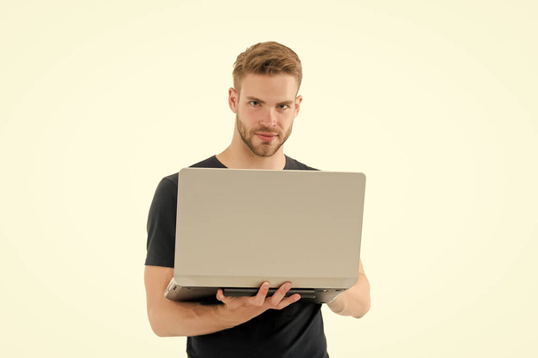 Laptop that is right for you. Handsome man hold laptop isolated on white. Professional laptop computer repairman or tech worker. Notebook and pc. New technology. Buy laptop computer, copy space - Photo, Image