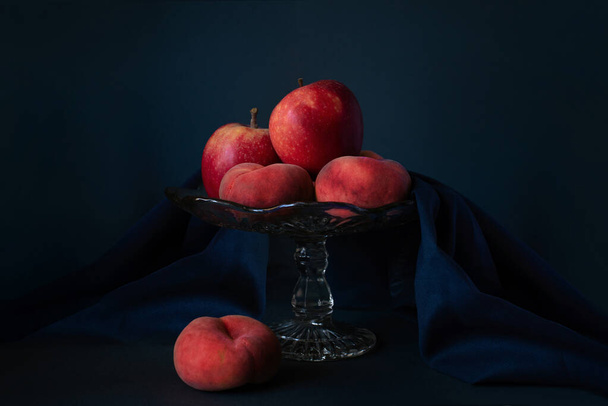 Apple and paraguay fruits on a glass pedestal fruit Stand, Fruits photography, Still life photography - Fotografie, Obrázek