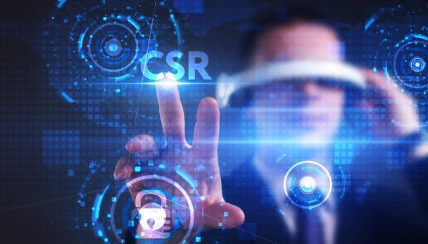 Business, technology, internet and network concept. Young businessman thinks over the steps for successful growth: CSR - 写真・画像