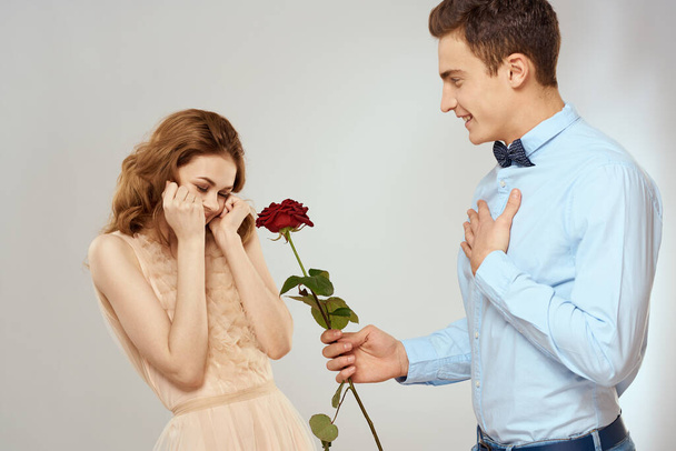 Man and woman with red rose romance love family couple holiday - Photo, Image