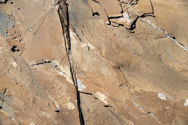Texture of a brown natural stone - Foto, Bild