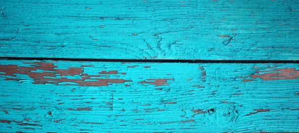 Planches horizontales en bois, peintes de couleur bleu clair. Texture avec fissures et bois brut avec espace de copie - Photo, image