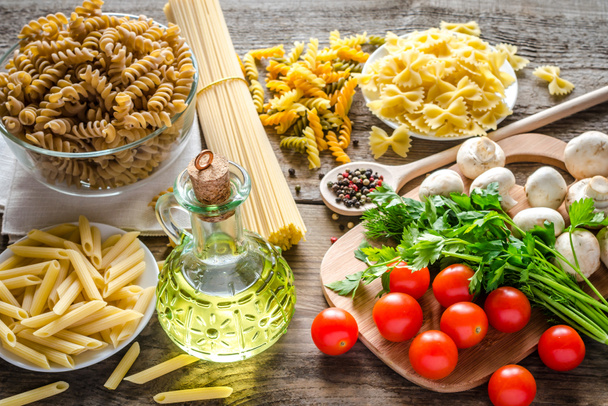 Various types of pasta with mushrooms and cherry tomatoes - Photo, Image