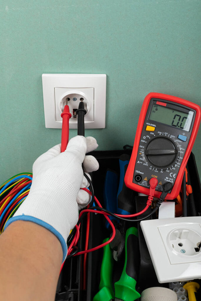 Tools for electrician needs: shocket multimeter, voltage testers, wire strippers, pliers, - Photo, image