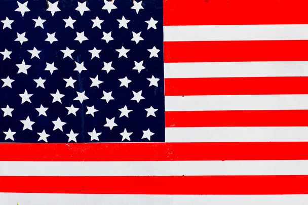 American flag painted on fence background. - Foto, Bild