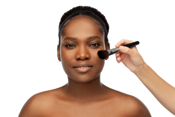 african woman and hand with make up brush - Φωτογραφία, εικόνα