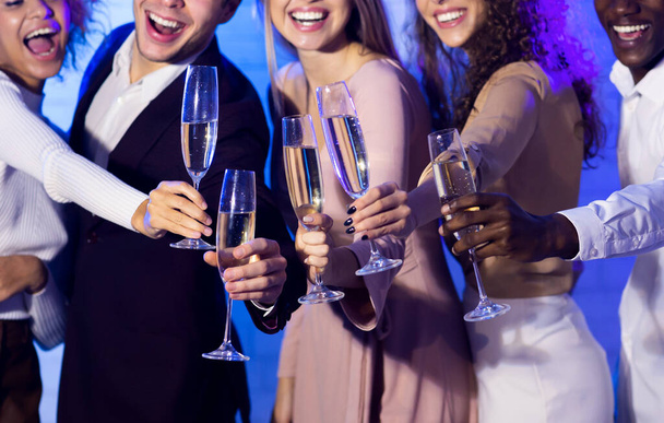 Millennials Clinking Champagne Glasses Having Fun At Party Indoor, Cropped - 写真・画像