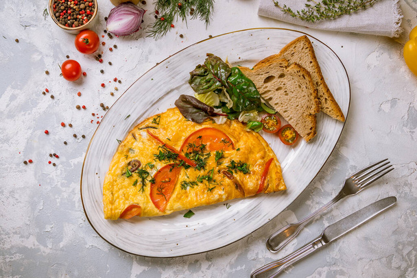 omelette breakfast on plate - Фото, изображение