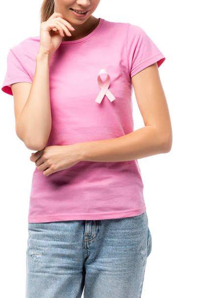 Cropped view of woman with pink ribbon of breast cancer awareness on t-shirt isolated on white - Valokuva, kuva