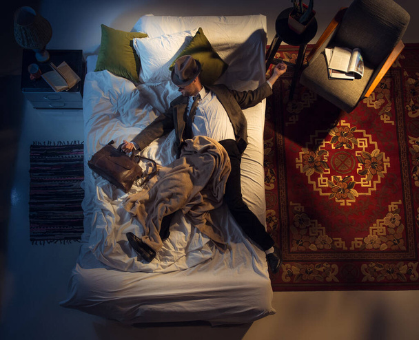 Portrait of a businessman, accountant sleeping in the bed at home - Fotografie, Obrázek