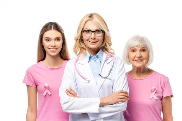 Women and doctor with crossed arms looking at camera isolated on white, concept of breast cancer  - Foto, imagen