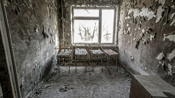 Chernobyl pripiat hospital asylum room with iron cradles  - Photo, Image