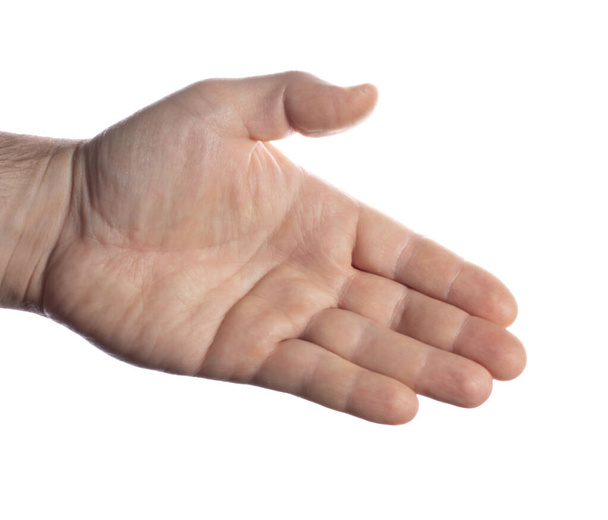 gros plan d'une main masculine avec une paume ouverte prête à accueillir avec une poignée de main sur un fond blanc, - Photo, image