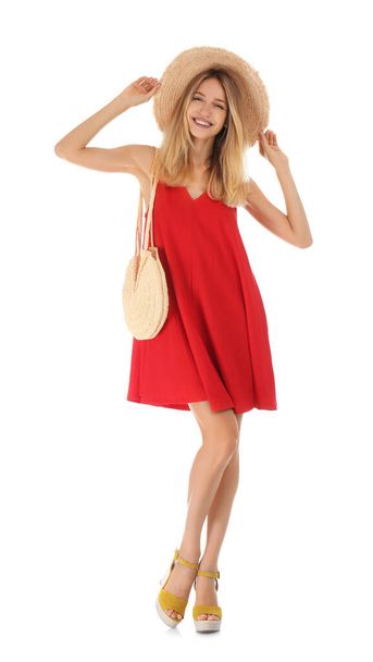 Young woman wearing stylish red dress on white background - Foto, Imagem