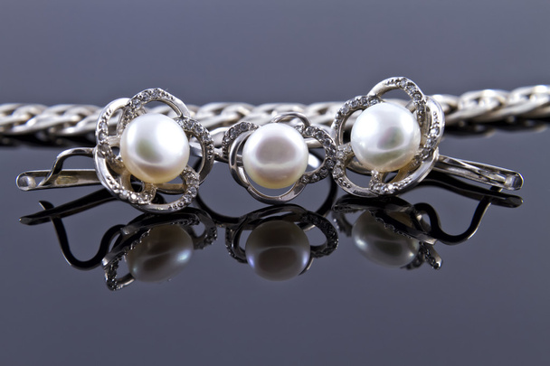 Set of silver earrings and a ring - Φωτογραφία, εικόνα