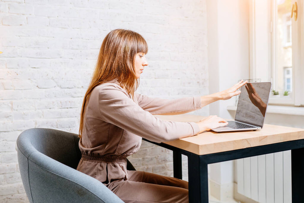 Posture concept. Woman working with computer at home office. - 写真・画像