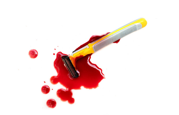 Razor bloody and drop blood on white background - Photo, Image