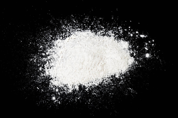 Flour close up image on black background - Foto, Imagen