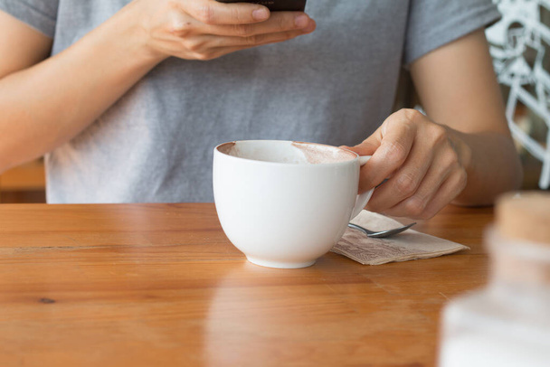 Woman enjoying warming drink, Late coffee in a cup. - Foto, immagini