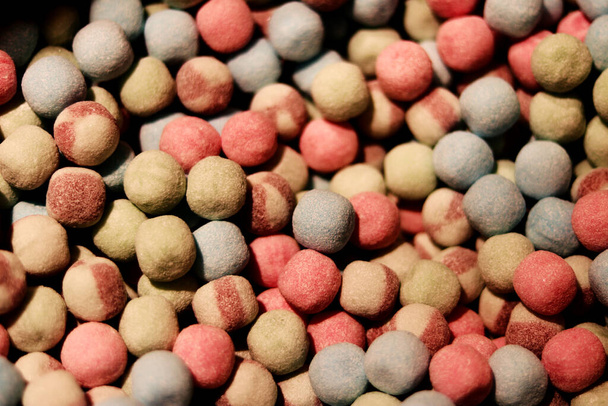 Pile of multicolored round candies - background - Photo, Image