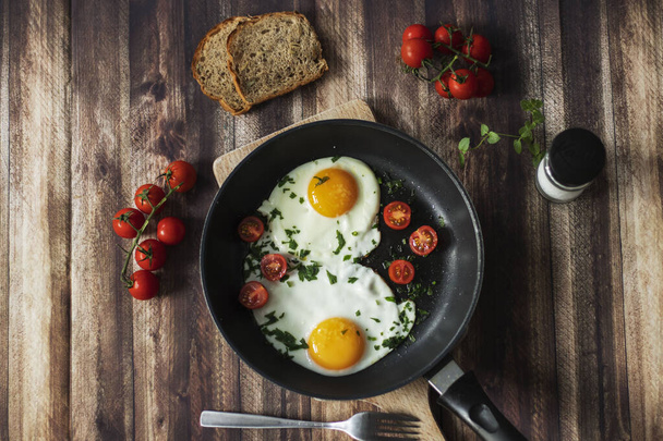 Fried eggs in a frying pan. - Photo, Image