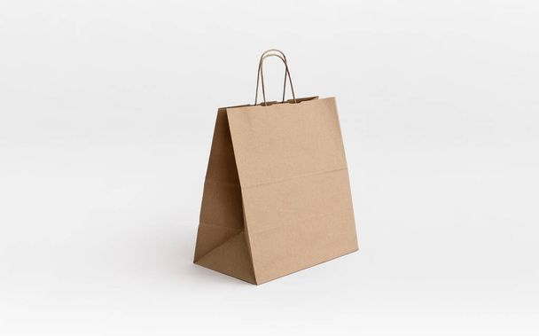 коричневый крафт бумажный пакет для забрать - Фото, изображение