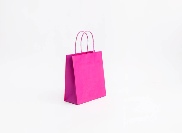 fucsia rózsaszín kis papírzacskó vásárló - Fotó, kép