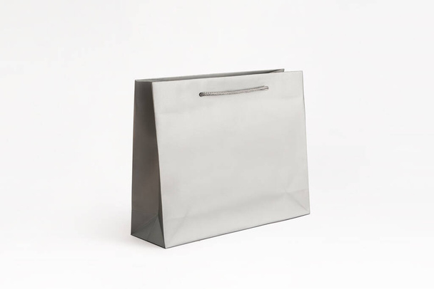 paper bag, silver paper bag, matt paper bag, matte silver paper bag, medium paper bag, paperbag, matt, matte, white background, isolated on white, shopping, luxury, shopping bag, luxury packaging, packaging, mock up, mockup, unbranded, un-branded, pr - Photo, Image